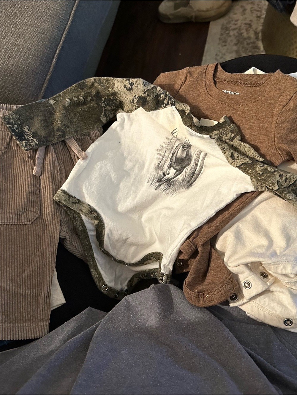 Lot of 7 pieces baby 0-3 and 3M pants and shirts/onsies